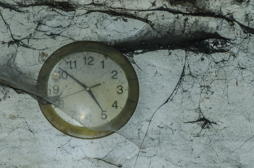 wall clock and cobwebs